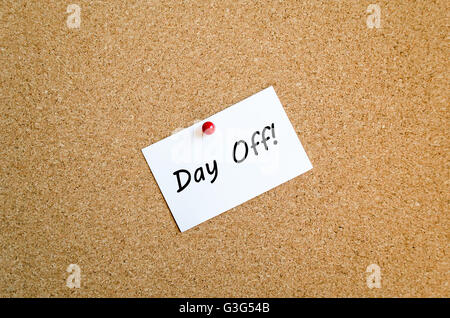 Sticky Note On Cork Board Background And Day Off Text Concept Stock Photo