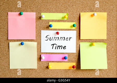 Sticky Note On Cork Board Background And Summer Time Text Concept Stock Photo