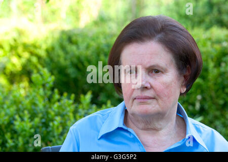 Portrait of senior woman outdoors Stock Photo