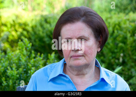 Portrait of senior woman outdoors Stock Photo
