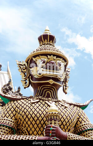 Giant Statue in Temple on sky background, Thailand. Art vintage style in Places of worship. Stock Photo