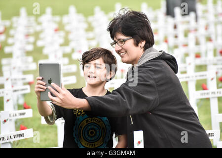 Auckland, New Zealand. 25th Apr, 2016. Members of public takes selfies during the Dawn Service at the Auckland War Memorial Museum . © Shirley Kwok/Pacific Press/Alamy Live News Stock Photo