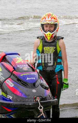 Liverpool, Merseyside, UK 11th June, 2016. 11 year old Lucy Gadsby from Tarleton in Lancashire, riding a 800cc Yamaha wins Junior Ski Lite and Ladies Ski Lite rounds in the JSRA British Championships at Crosby Marina, Liverpool. Sport sensation Lucy, who only started jet ski racing a year ago, is currently leading the junior championship by winning here again today. Credit:  MediaWorldImages/Alamy Live News Stock Photo