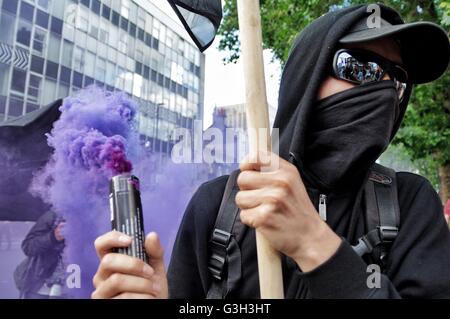 London, UK. 24th June 2016. Pro-refugee activists march through the City of London on the day the UK voted to leave the European Union, a vote they view as anti-immigrant. Credit:  Denis McWilliams/Alamy Live News Stock Photo