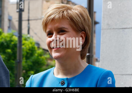 Glasgow, Scotland, UK. 25th June, 2016. Nicola Sturgeon took part in the Annual Armed Forces Day Celebrations in George Square, Glasgow. She was part of the Dignitaries on the podium and 'Took the Salute' along with the Lord Lieutenant, Provost Sadie Docherty and senior officers representing all the forces. Credit:  Findlay/Alamy Live News Stock Photo