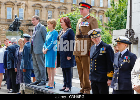 Glasgow, Scotland, UK. 25th June, 2016. Nicola Sturgeon took part in the Annual Armed Forces Day Celebrations in George Square, Glasgow. She was part of the Dignitaries on the podium and 'Took the Salute' along with the Lord Lieutenant, Provost Sadie Docherty and senior officers representing all the forces. Credit:  Findlay/Alamy Live News Stock Photo