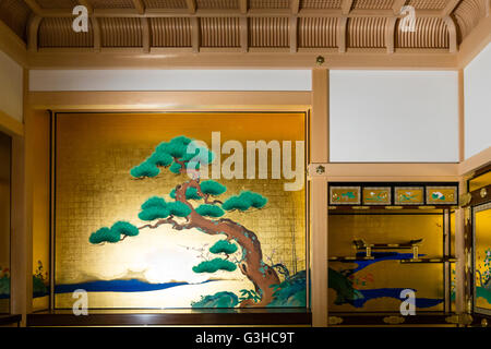 Japan, Nagoya castle. Reconstructed Hommaru Palace interior. Room, part of the Omote Shoin, main hall, with wall panel paintings of flowers and trees. Stock Photo