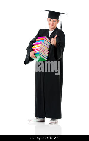 Graduation man holding books Stock Photo