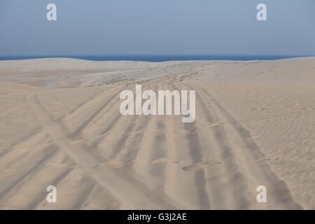 Lines in the sand. Tyre tracks. Tire tracks. Stock Photo