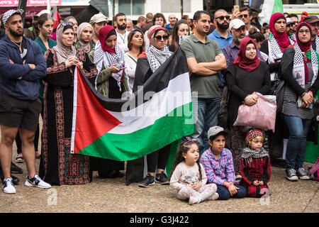 Sydney, Australia. 15th May, 2016. Palestinian supporters gathered at Sydney Town Hall listen to speakers. Hundred of demonstrators rallied and marched in Sydney under a heavy police presence to commemorate the the 68th anniversary of the mass exodus of 750,000 Palestinians from Israel in 1948 in an event known as Nakba or 'catastrophe' to Palestinians and their supporters. © Richard Ashen/PacificPress/Alamy Live News Stock Photo