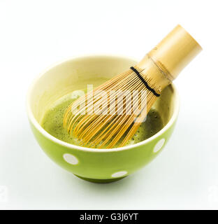 Japanese green tea, green matcha, preparation traditional Japanese green tea. Tea is ready for drinking. Photo is cut out from the original background. Stock Photo