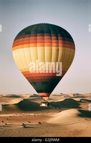 Vintage photo of hot air balloon over desert Stock Photo