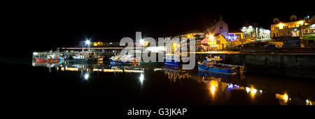 Seahouses Harbour and fishing boats at night, Northumberland Stock Photo