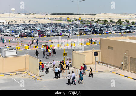 QATAR, Doha, parking place at religious complex with christian churches for migrant workers Stock Photo