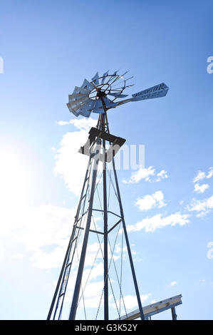 Wind powered water pump / windpump at vineyard in Franschhoek at sunset ...