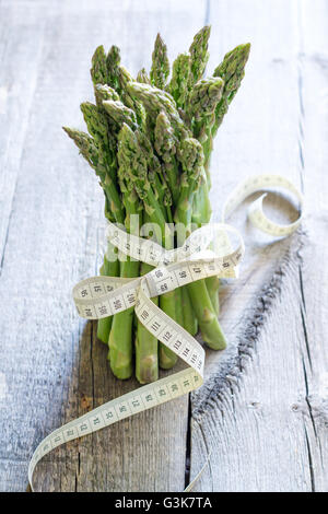Asparagus and centimeter healthy lifestyle and diet abstract concept Stock Photo