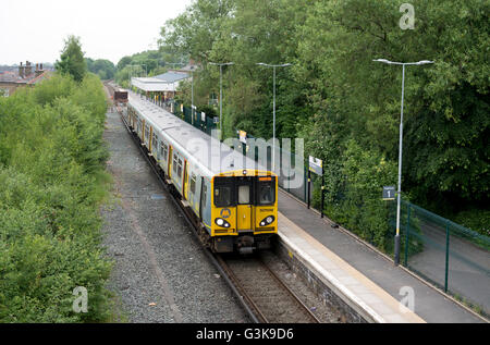 Merseyrail Class 507 train leaving Ormskirk station, Lancashire, England, UK Stock Photo