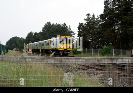 Merseyrail Class 507 electric train at Freshfield, Formby, Lancashire, England, UK Stock Photo