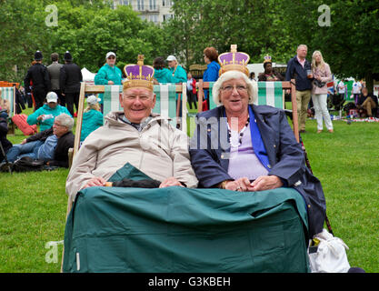 People celebrating Queen Elizabeth's 90th birthday celebrations in St James Park London Stock Photo