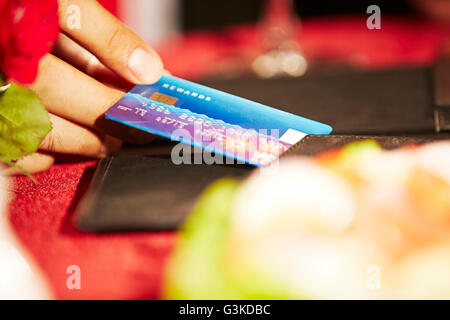 1 Adult Man hotel Bills giving Stock Photo
