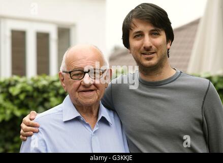 Previously unissued photo dated 25/5/2016 of Holocaust survivor Zigi Shipper with his Grandson Darren Richman at his home in Bushey, Hertfordshire. The 86 year old who has spent his retirement sharing harrowing wartime experiences with British schoolchildren is to feature in a &quot;time capsule&quot; documentary designed to ensure the horrors of Auschwitz are never forgotten. Stock Photo