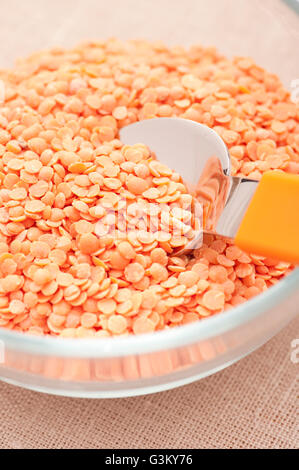 Bowl with organic red lentils Stock Photo