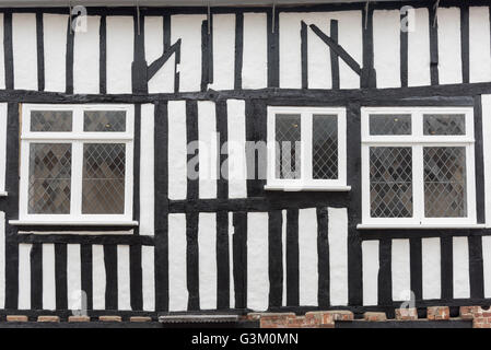 Close up architectural detail of a black and white painted timber framed old building in Winchester UK Stock Photo