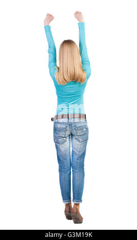 back view of dancing young beautiful woman. girl watching. Rear view people collection. backside view of person. Isolated over white background. Stock Photo