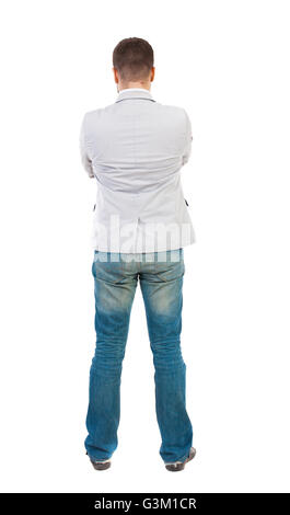 back view of Business man looks. Rear view people collection. backside view of person. Isolated over white background. A guy in a white jacket folded his arms across his chest. Stock Photo