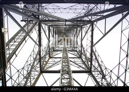 View up the inside of the elctricity pylon by the River Thames at West Thurrock. At 600 feet, the tallest pylon in the UK. Stock Photo