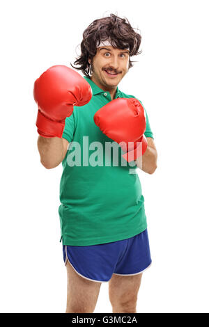 Vertical shot of a retro guy with red boxing gloves isolated on white background Stock Photo