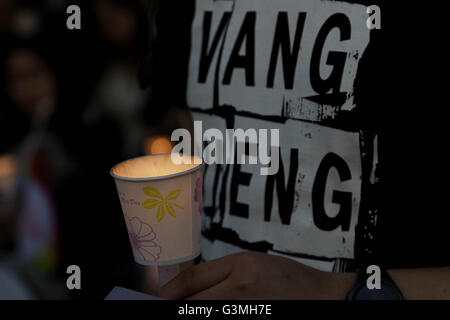 Seoul, South Korea. 13th June, 2016. People hold candles during a vigil to pay tribute to the victims of yesterday's Orlando shooting in Seoul, South Korea. The vigil was held for victims of the Orlando nightclub shooting which killed at least 50 people and was the deadliest U.S. mass shooting to date. Credit:  Seung Il Ryu/ZUMA Wire/Alamy Live News Stock Photo