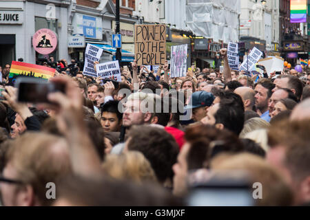 Old Compton Street, Soho, London, June 13th 2016. Thousands of LGBT people and their friends converge on Old Compton Street in London's Soho to remember the fifty lives lost in the attack on gay bar Pulse in Orlando, Florida. PICTURED: Part of the thousands-strong crowd with their defiant banners. Credit:  Paul Davey/Alamy Live News Stock Photo