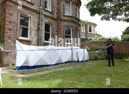 Ryde, Isle of Wight, UK. 14th June, 2016. A 53-year-old woman has been arrested following the suspicious death of a man at a flat in Ryde this afternoon (Monday).  Police and paramedics were called to a property on East Hill Road, Ryde at just after 4pm on Monday. A cordon was erected and a woman swiftly detained. Hampshire Constabulary have now confirmed that a 53-year-old female has been arrested in connection with the death and that a murder investigation has been launched. ?The detained person, who is yet to be identified, has been taken to Newport Police Station Credit:  uknip/Alamy Live  Stock Photo