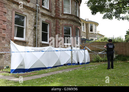 Ryde, Isle of Wight, UK. 14th June, 2016. A 53-year-old woman has been arrested following the suspicious death of a man at a flat in Ryde this afternoon (Monday).  Police and paramedics were called to a property on East Hill Road, Ryde at just after 4pm on Monday. A cordon was erected and a woman swiftly detained. Hampshire Constabulary have now confirmed that a 53-year-old female has been arrested in connection with the death and that a murder investigation has been launched. ?The detained person, who is yet to be identified, has been taken to Newport Police Station Credit:  uknip/Alamy Live  Stock Photo