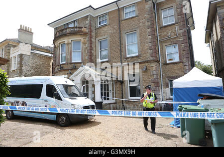 Ryde, Isle of Wight, UK. 14th June, 2016. A 53-year-old woman has been arrested following the suspicious death of a man at a flat in Ryde this afternoon (Monday).  Police and paramedics were called to a property on East Hill Road, Ryde at just after 4pm on Monday. A cordon was erected and a woman swiftly detained. Hampshire Constabulary have now confirmed that a 53-year-old female has been arrested in connection with the death and that a murder investigation has been launched. ?The detained person, who is yet to be identified, has been taken to Newport Police Station Credit:  uknip/Alamy Live  Stock Photo