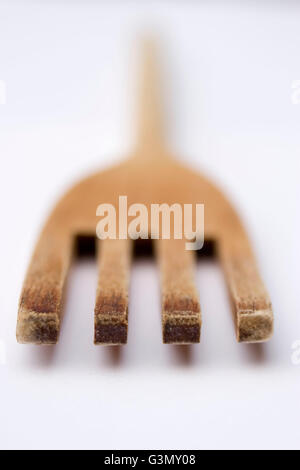 Well-used old wooden fork Stock Photo