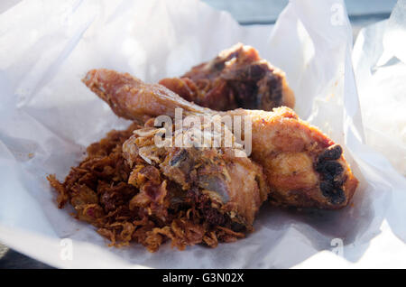 Hat Yai Fried Chicken recipes served with Onion fried Stock Photo