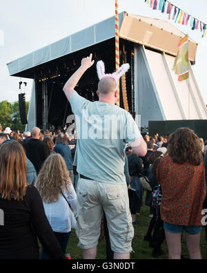 Middle aged people looking silly dancing to Public Enemy at Common People music festival in Oxford, Britain Stock Photo