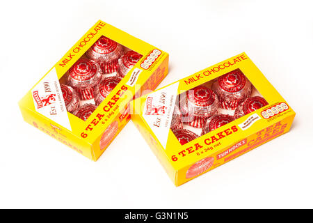 Tunnock's tea cakes, Traditional chocolate and Marshmallow cakes isolated on a white studio background. Stock Photo