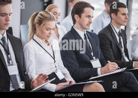 Business group of people making notes during a meeting conference Stock Photo