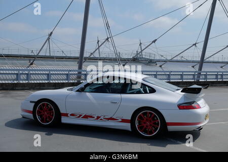 Porsche 996 GT3 RS in industrial roof-top car park setting Stock Photo