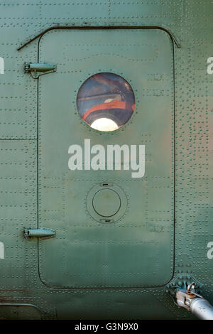 Old green painted aircraft door close up. Stock Photo