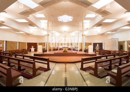 Interior of modern catholic church with pews and altar, St Mary's Church in Alton, Hampshire, England, United Kingdom, Europe Stock Photo