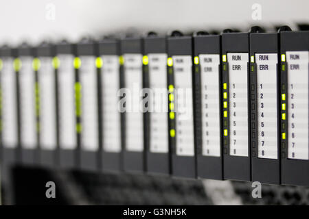 Programmable logic controllers installed in a control panel. Selective focus. Stock Photo