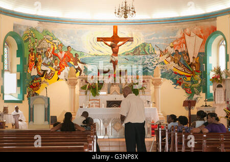 Interior of St. Mark Roman Catholic Church with murals of local fishing life, Soufriere, Dominica, West French Indies, Caribbean Stock Photo