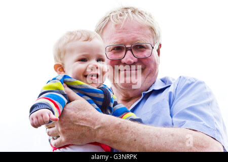 Grandfather holding his grandson Stock Photo