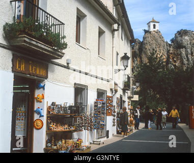Spain, Alicante Province, Guadalest, tourists by the souvenir shops near the Moorish Castle. Stock Photo