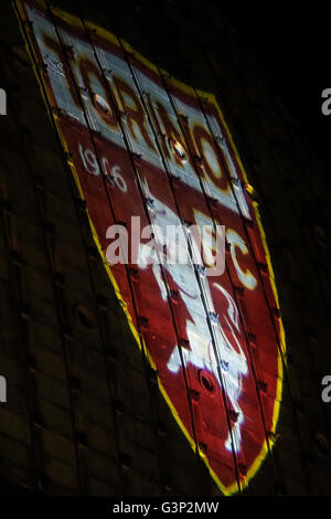 On 4 may, the 67 anniversary of the Superga air disaster, where players of the 'Grande Torino' lost their lives in a plane crash, the symbol of Turin, the Mole Antonelliana is lighted with red-Garnet and the main façade is projected the team's symbol (Photo by: Daniela Parra Saiani/Pacific Press) Stock Photo