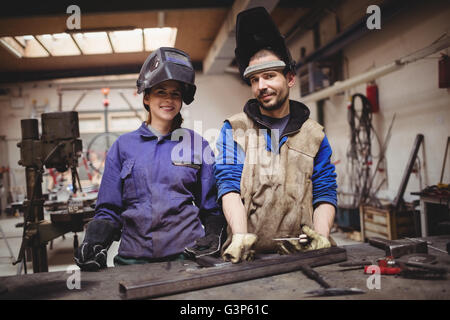 Portrait of confident metalworkers Stock Photo